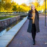 happy-attractive-woman-walking-autumn-city-park (1)
